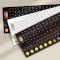 Наклейки на клавиатуру SampleZone чёрные с оранжевыми и белыми буквами, EN/UA/RU (SZ-BK-RS)